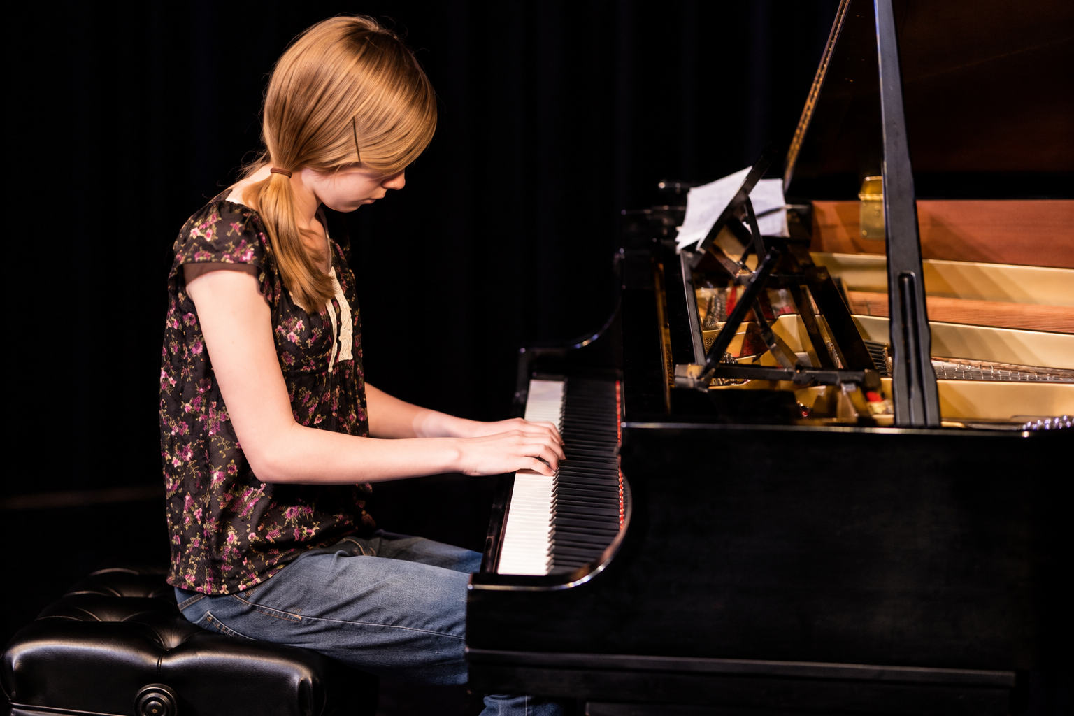 Pianist at a grand piano · MBMS archive